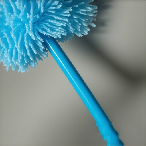 A microfiber duster attached to an extendable pole cleaning ceiling beams at height