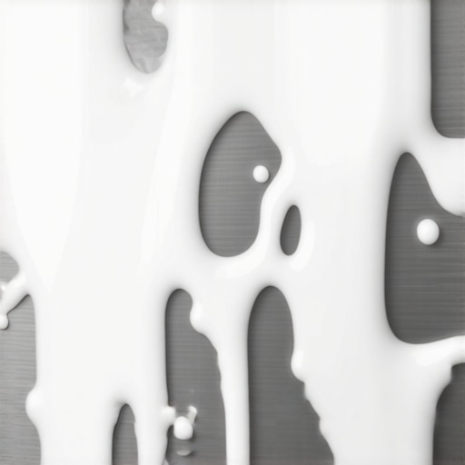 White foam lifting grease from a stainless steel wall