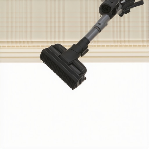 Handheld vacuum cleaning a fabric valance with brush attachment